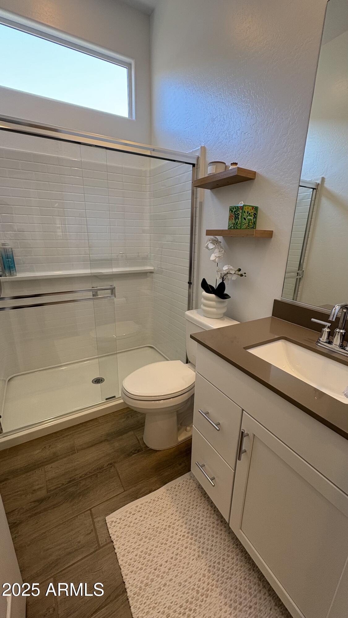 3240 West Peak View Road Phoenix, AZ 85083 - Photo 35 of 37 a bathroom with a granite countertop sink toilet and shower