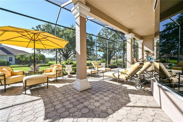 a utility room with sink dryer and washer