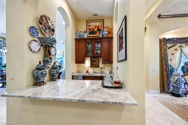 a view of a entryway door with couch