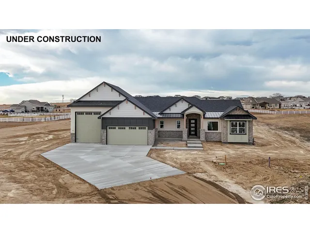 a black and white photo of a house