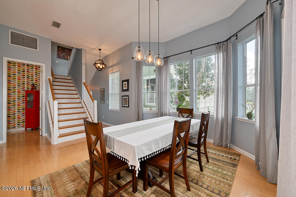 1470 Marshview Court Atlantic Beach, FL 32233 - Photo 30 of 51 a view of a dining room with furniture window and wooden floor