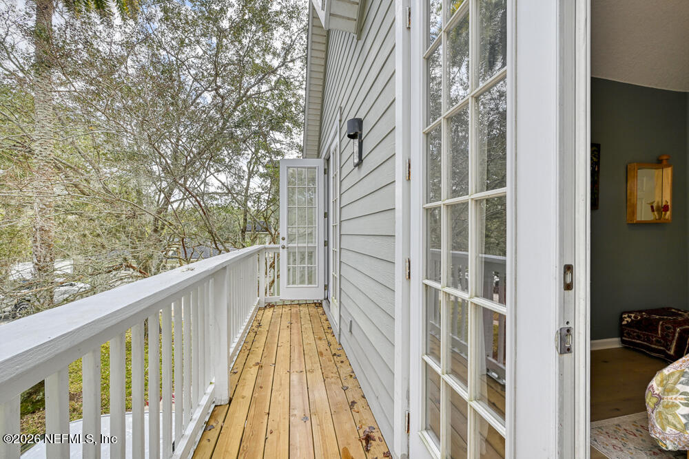1470 Marshview Court Atlantic Beach, FL 32233 - Photo 42 of 51 a view of a balcony with wooden floor and fence