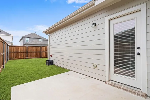 a view of a backyard with a garden