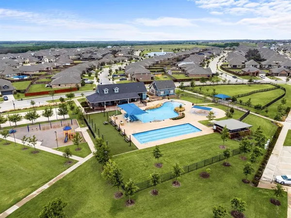 an aerial view of a house with a ocean view
