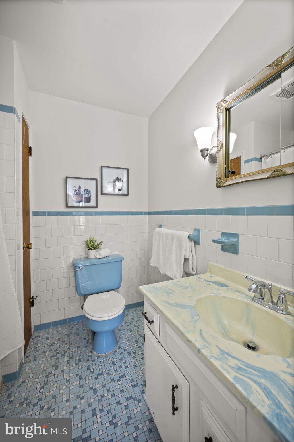 2502 Fox Road Fallston, MD 21047 - Photo 18 of 59 a bathroom with a granite countertop toilet sink and mirror