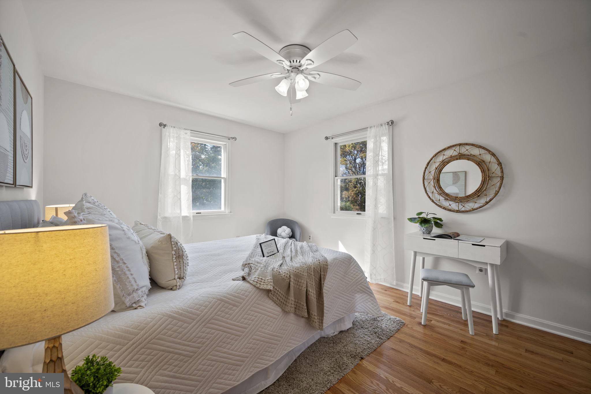 2502 Fox Road Fallston, MD 21047 - Photo 22 of 59 a bedroom with a bed and a chandelier