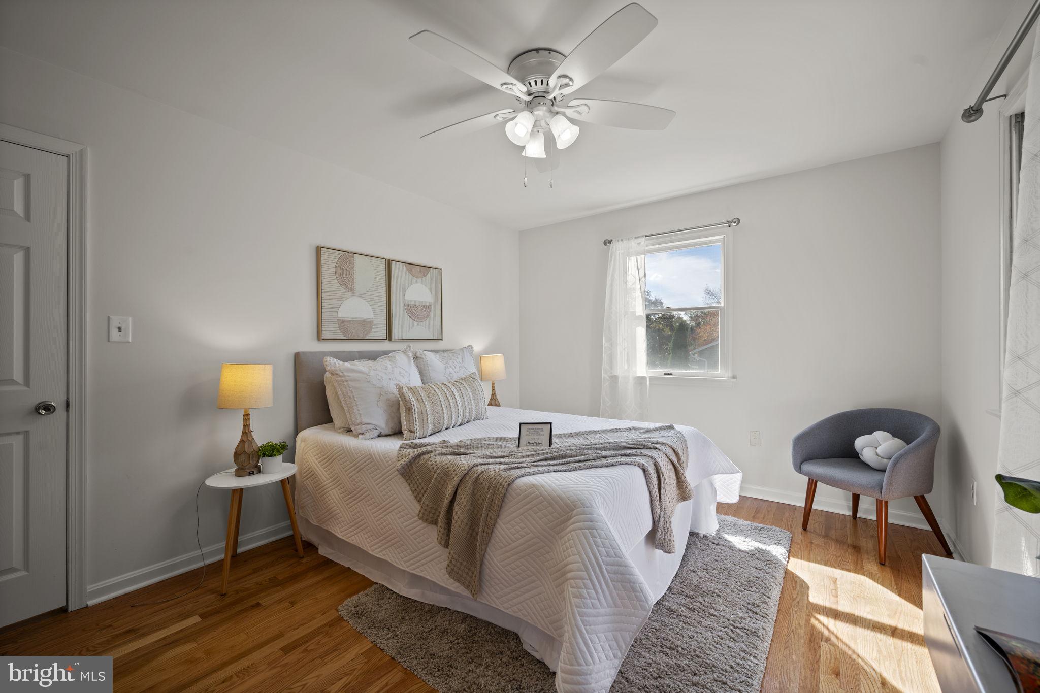 2502 Fox Road Fallston, MD 21047 - Photo 23 of 59 a bedroom with a bed and a chandelier