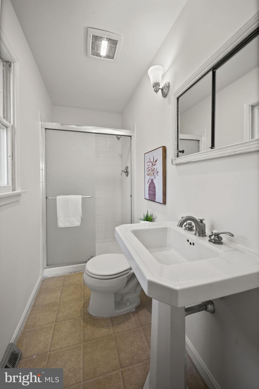 2502 Fox Road Fallston, MD 21047 - Photo 26 of 59 a bathroom with a sink a toilet and mirror