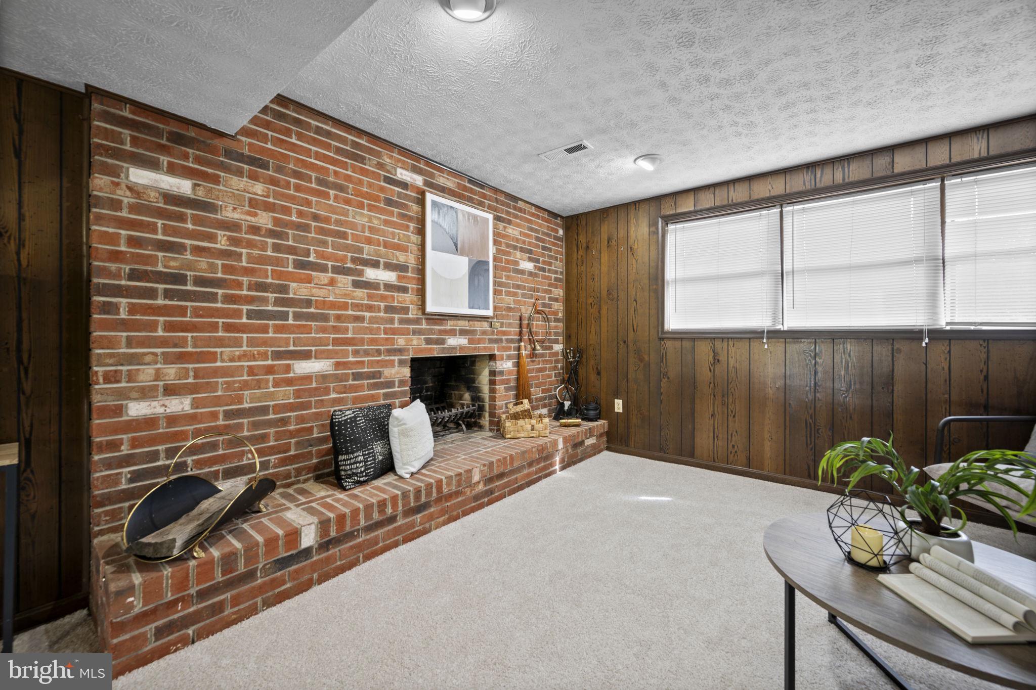 2502 Fox Road Fallston, MD 21047 - Photo 34 of 59 a living room with furniture windows and a fireplace
