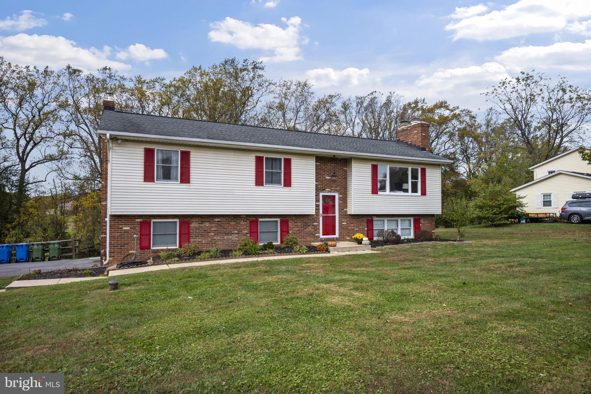 2502 Fox Road Fallston, MD 21047 - Photo 54 of 59 a view of a white house with a big yard and large trees