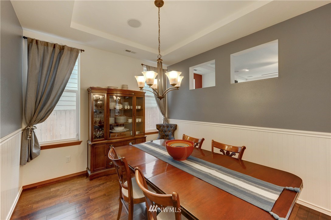 22921 42nd Drive Southeast Bothell, WA 98021 - Photo 16 of 38 a room with furniture mirror and wooden floor
