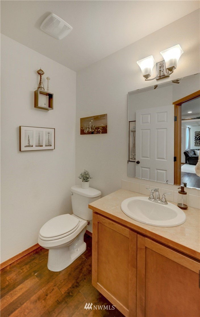 22921 42nd Drive Southeast Bothell, WA 98021 - Photo 17 of 38 a bathroom with a sink a toilet and a mirror
