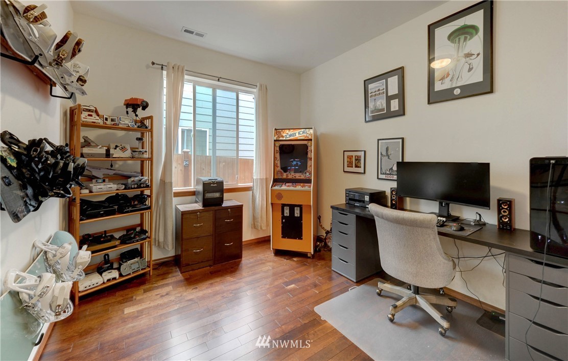 22921 42nd Drive Southeast Bothell, WA 98021 - Photo 18 of 38 a view of a livingroom with workspace and a window