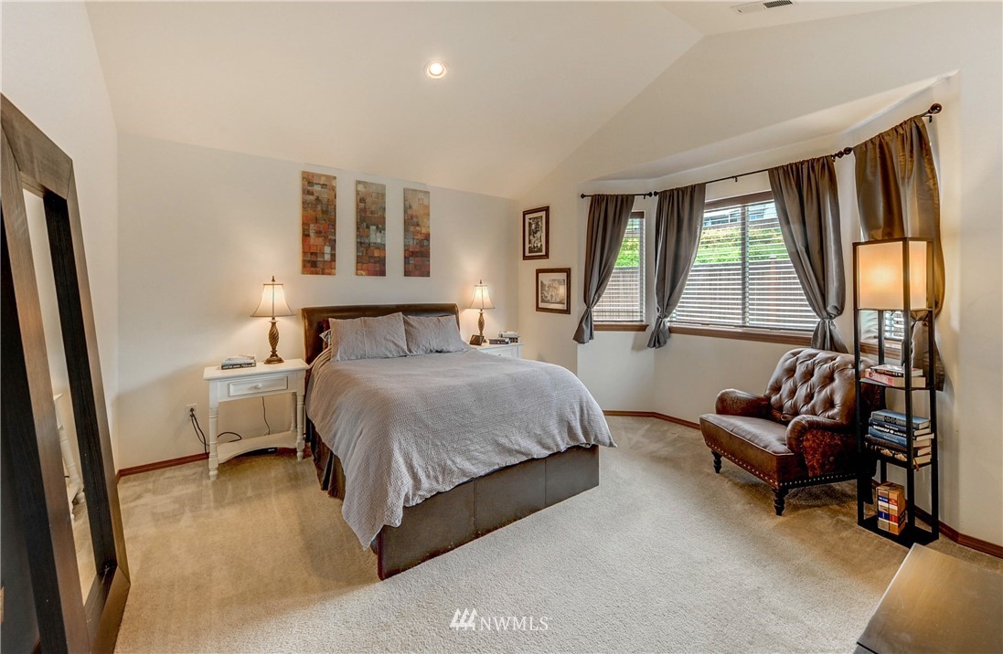 22921 42nd Drive Southeast Bothell, WA 98021 - Photo 24 of 38 a bedroom with a bed and a large window