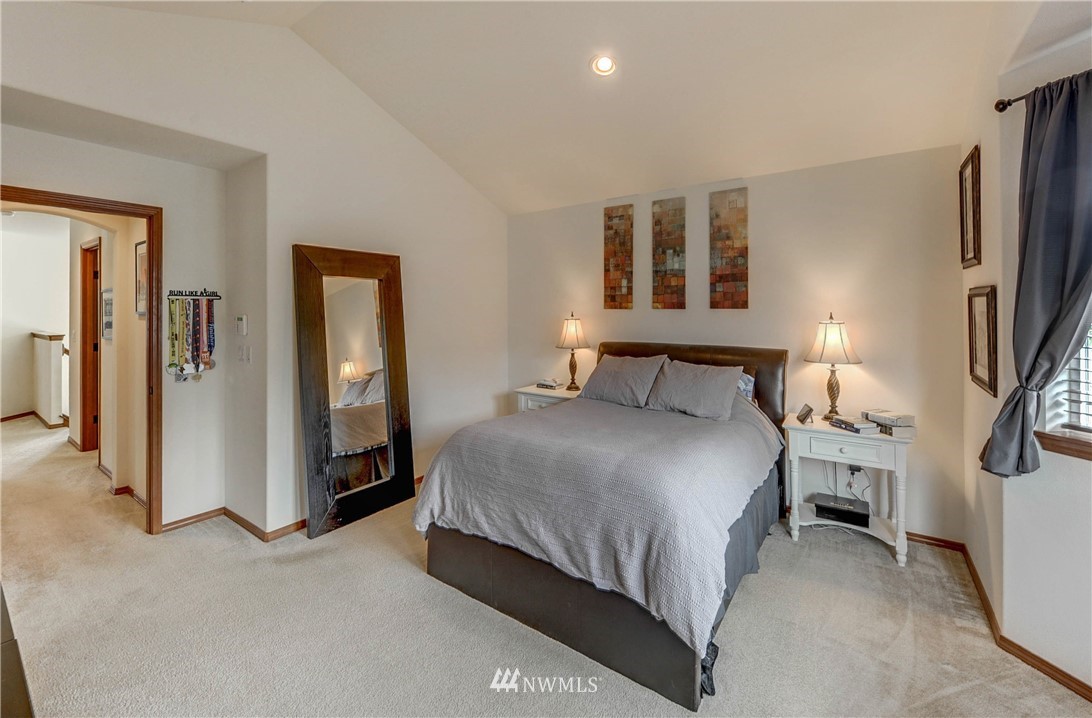 22921 42nd Drive Southeast Bothell, WA 98021 - Photo 25 of 38 a bedroom with a bed and a lamp