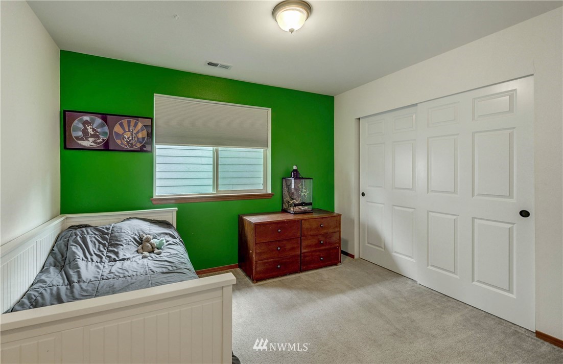 22921 42nd Drive Southeast Bothell, WA 98021 - Photo 30 of 38 a living room with window and a wooden floor