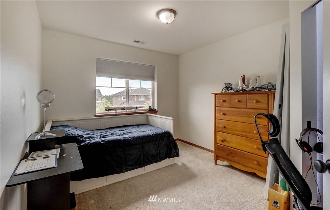 22921 42nd Drive Southeast Bothell, WA 98021 - Photo 31 of 38 a bedroom with a bed and a window