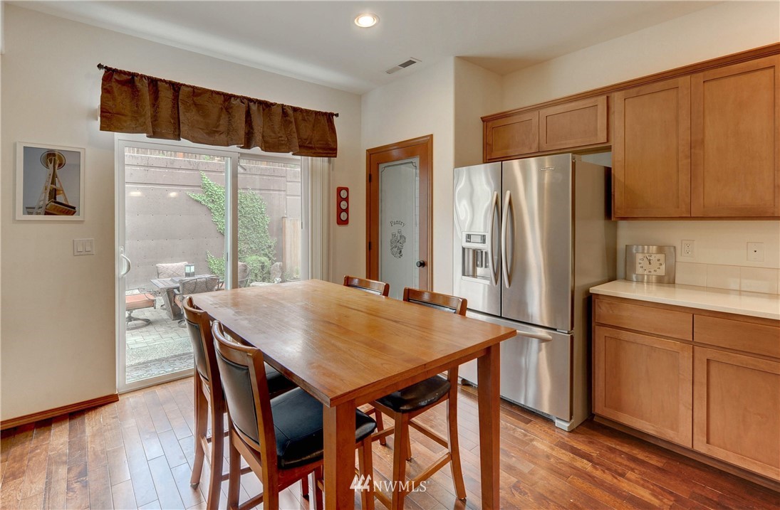 22921 42nd Drive Southeast Bothell, WA 98021 - Photo 6 of 38 a kitchen with stainless steel appliances a refrigerator and a stove top oven