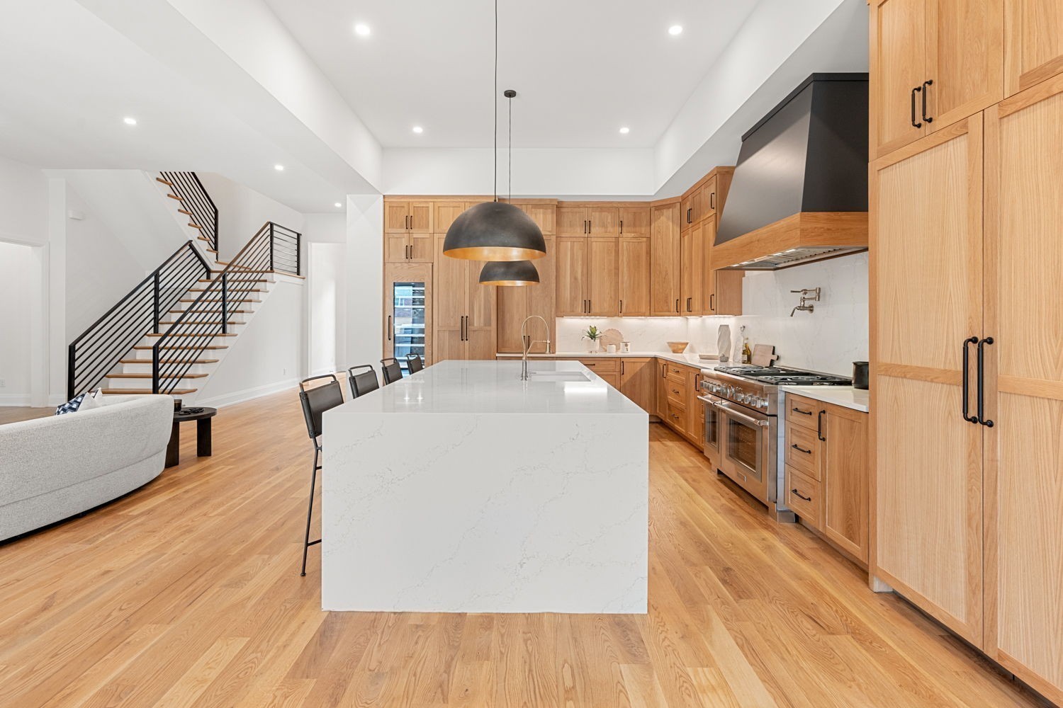 2915 Compton Road Nashville, TN 37215 - Photo 12 of 75 a large kitchen with stainless steel appliances a large center island attached withe living room