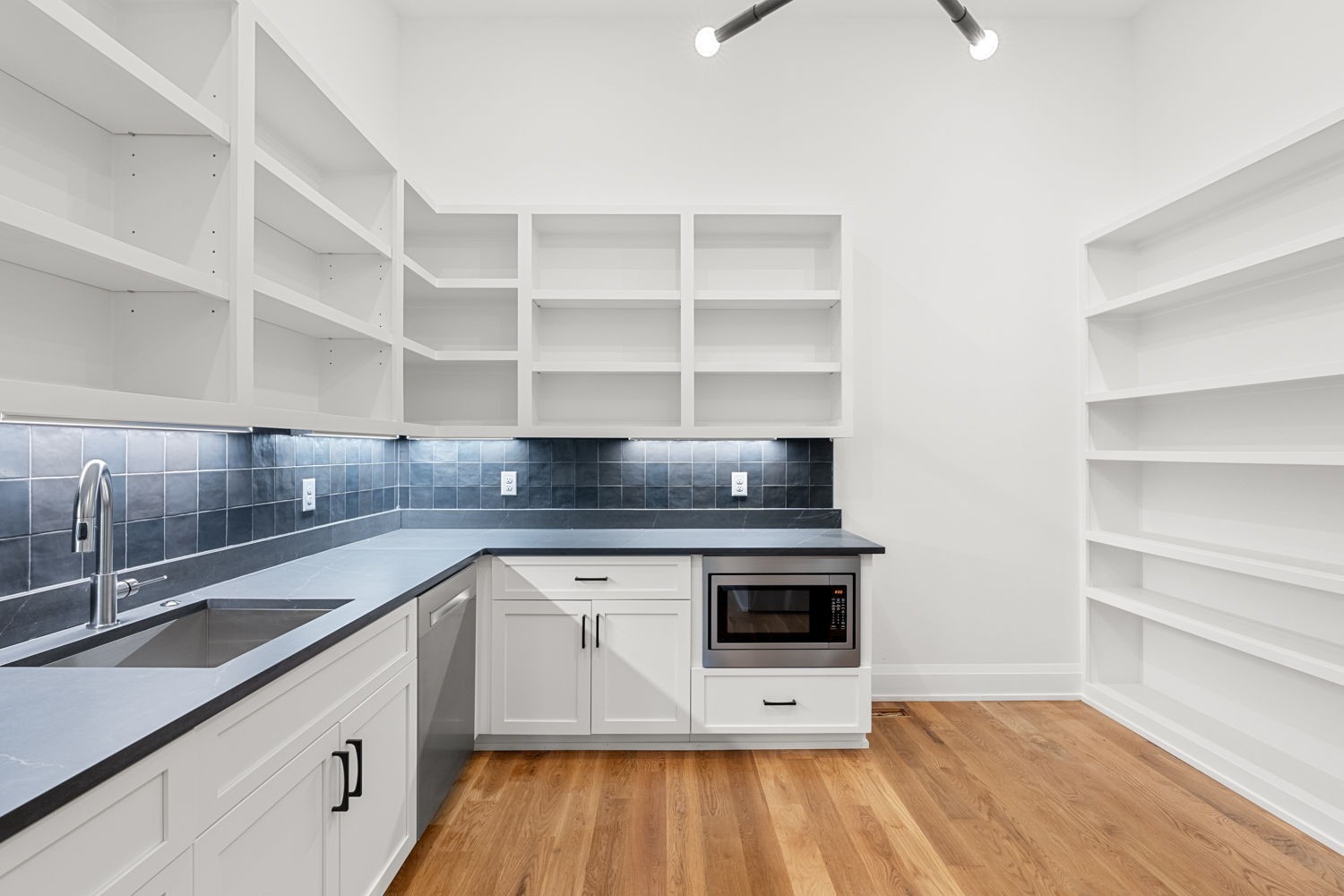 2915 Compton Road Nashville, TN 37215 - Photo 17 of 75 a kitchen with a sink cabinets and wooden floor