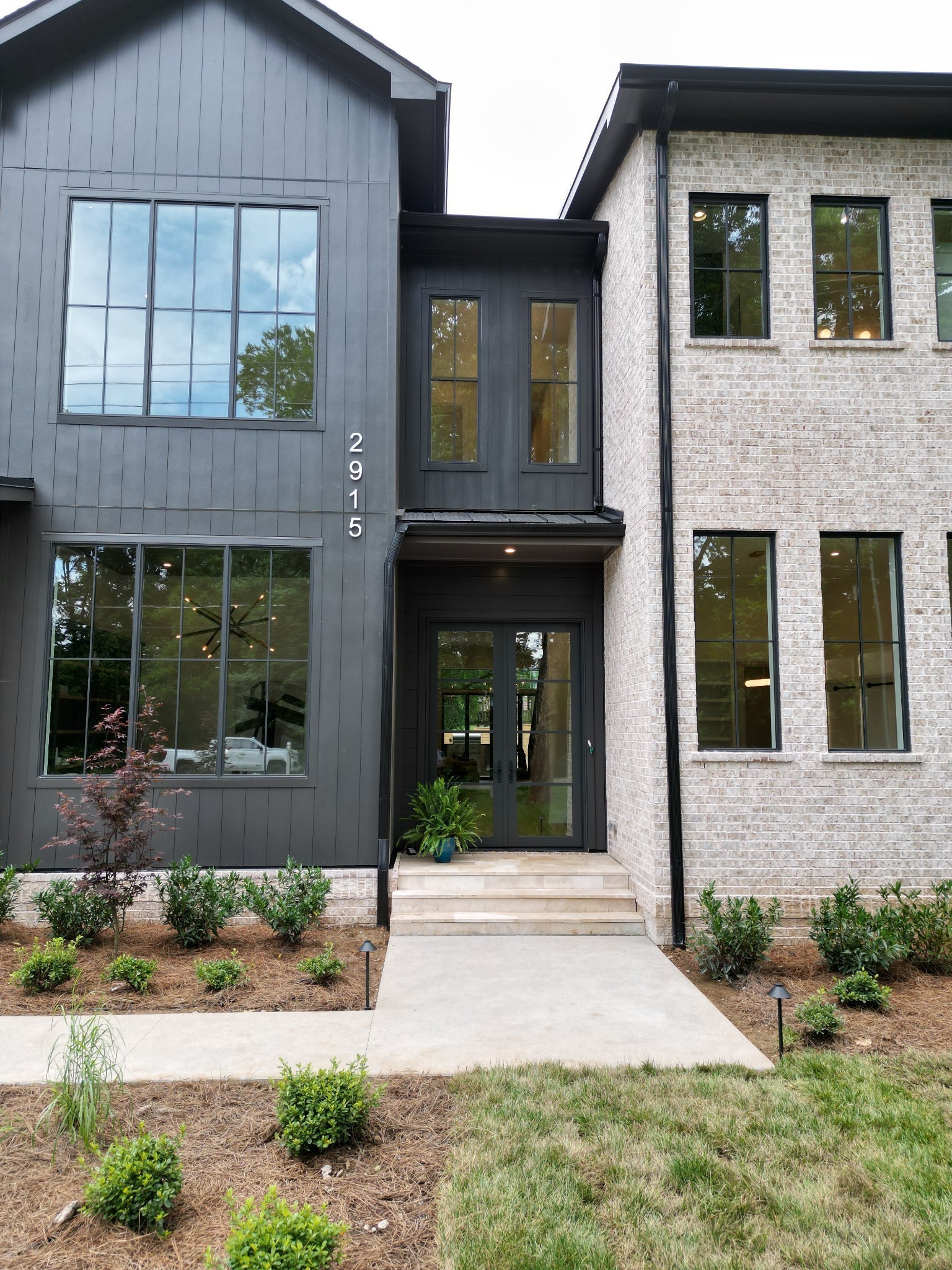 2915 Compton Road Nashville, TN 37215 - Photo 3 of 75 a front view of a house with garden and plants