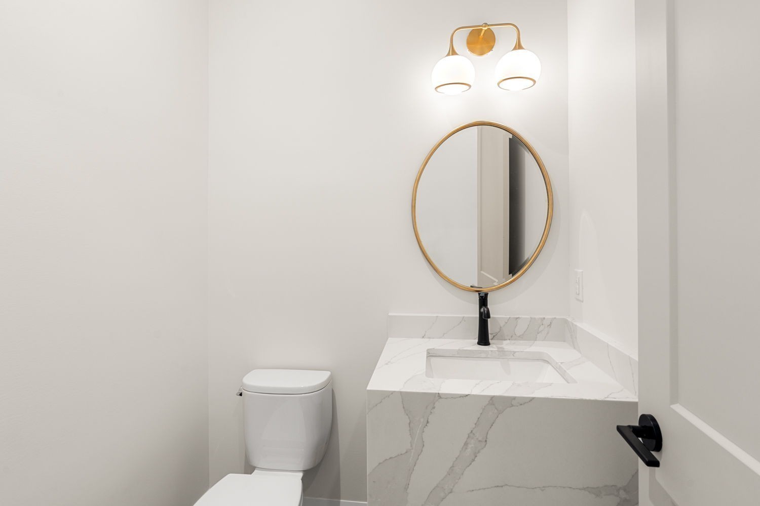 2915 Compton Road Nashville, TN 37215 - Photo 36 of 75 a bathroom with a toilet a sink and a mirror