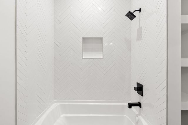 a outdoor space with patio the couches and a fireplace