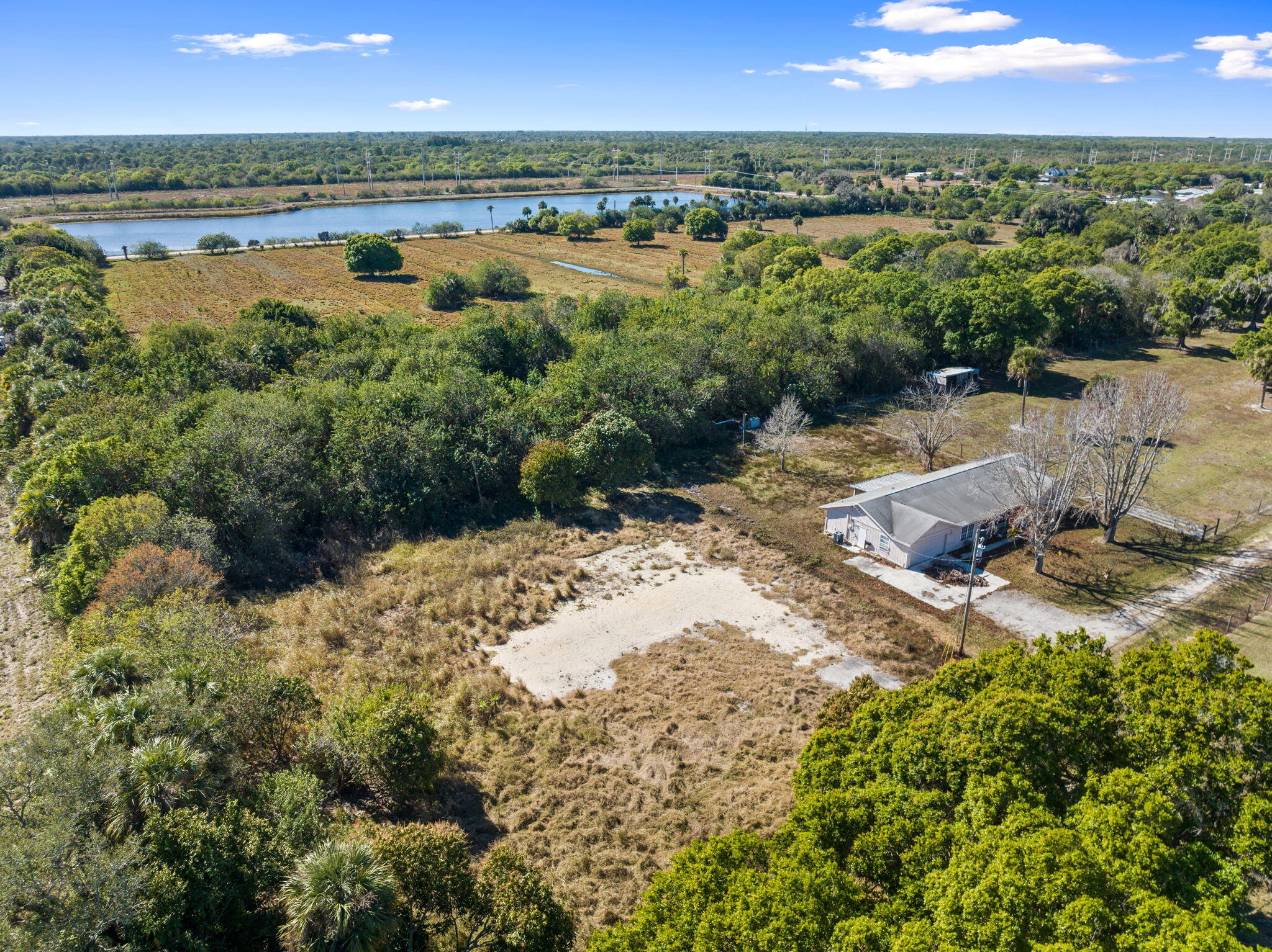 6406 Oleander Avenue Fort Pierce, FL 34982 - Photo 3 of 9 a view of a city with lake view