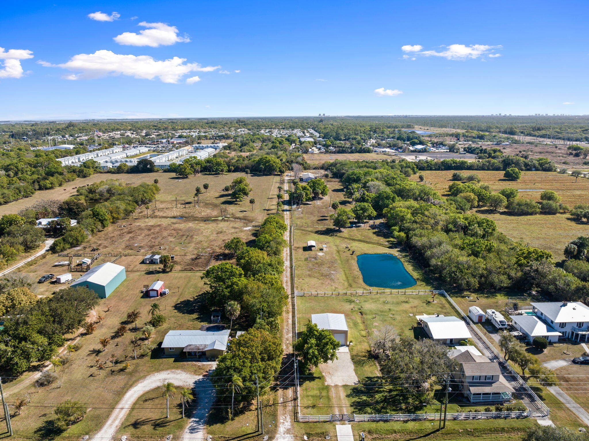 6406 Oleander Avenue Fort Pierce, FL 34982 - Photo 6 of 9 an aerial view of residential houses with outdoor space