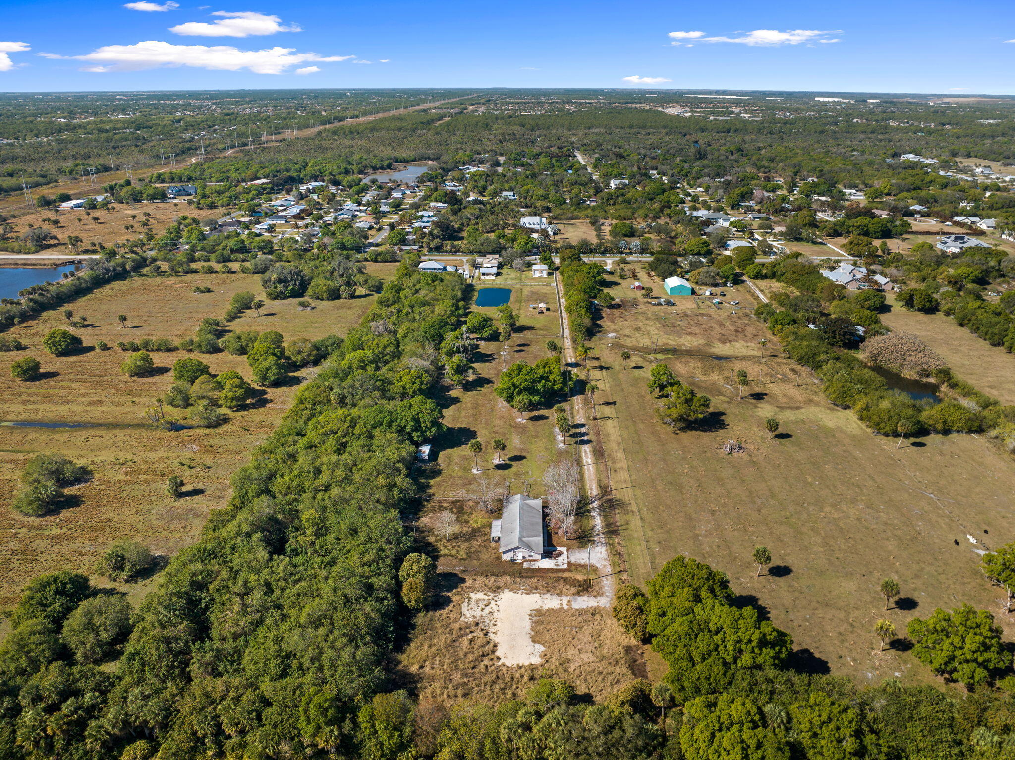 6406 Oleander Avenue Fort Pierce, FL 34982 - Photo 9 of 9 an aerial view of residential houses with outdoor space