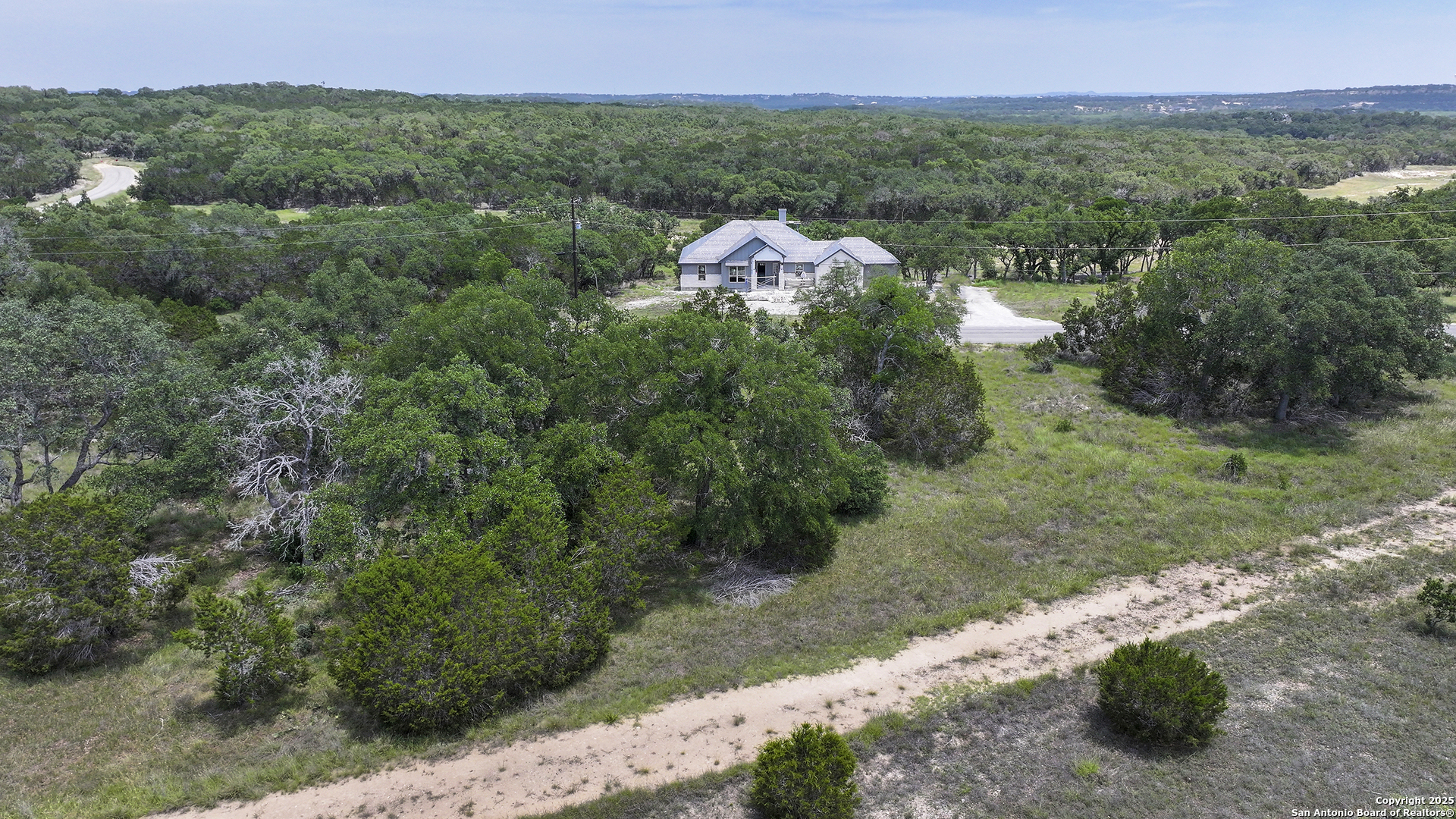 314 Serenity Pass Spring Branch, TX 78070 - Photo 26 of 26 a view of a bunch of trees and bushes