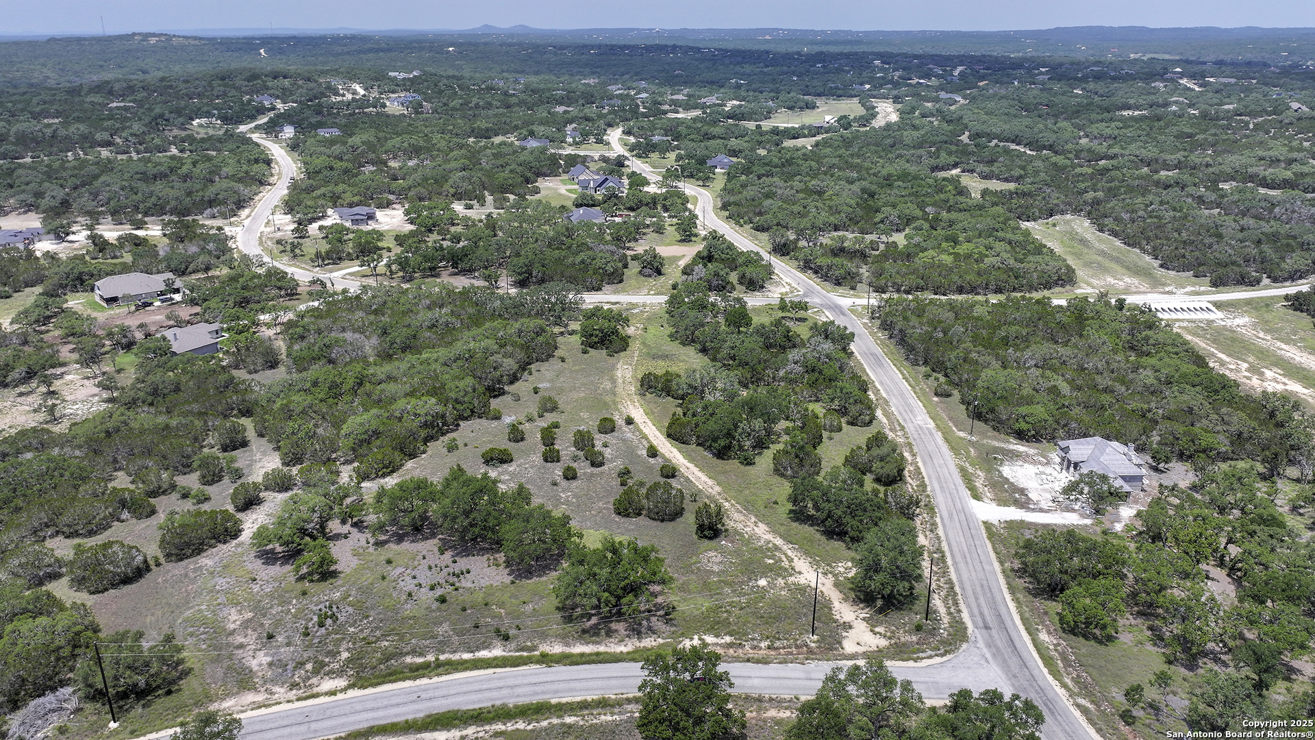 314 Serenity Pass Spring Branch, TX 78070 - Photo 8 of 26 an aerial view of residential houses with outdoor space and trees