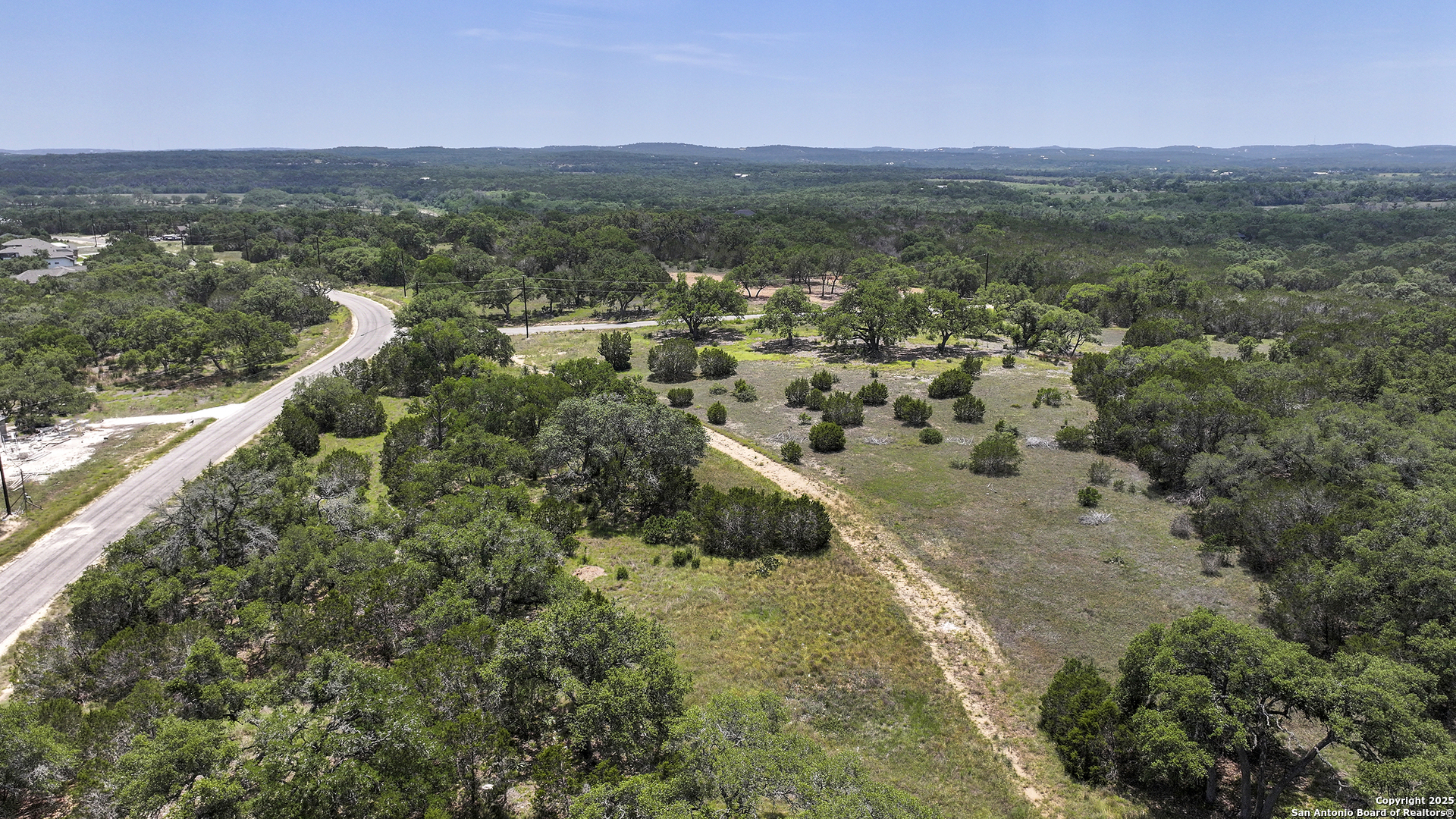 314 Serenity Pass Spring Branch, TX 78070 - Photo 9 of 26 a view of a city with lush green forest