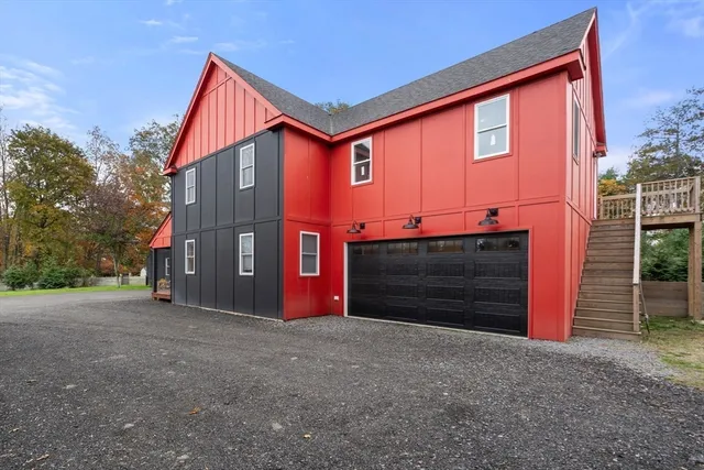 a front view of a house with a garage
