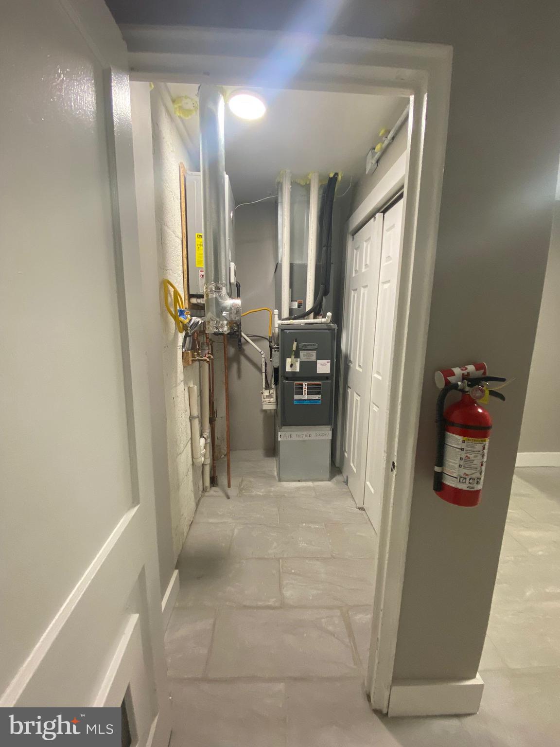 203 Kinsley Road Pemberton, NJ 08068 - Photo 8 of 9 a view of a hallway with workspace and a window