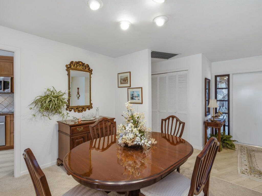 314 Torrey Pines Point Naples, FL 34113 - Photo 4 of 21 a dining room with furniture and wooden floor