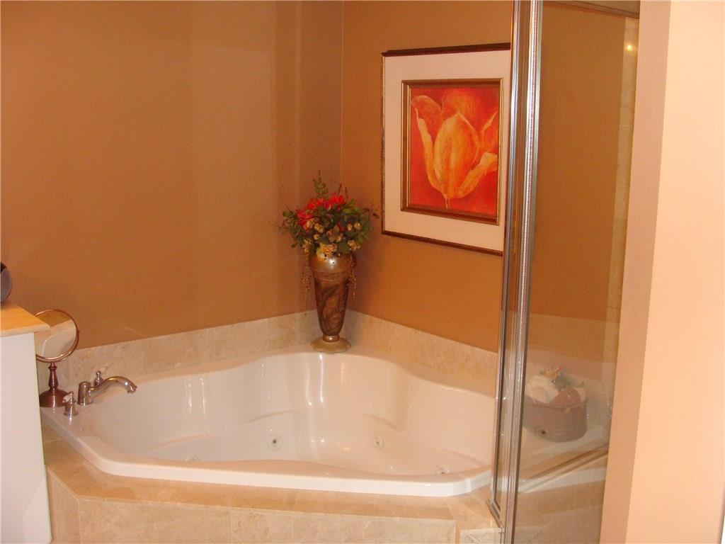2001 North Ocean Boulevard, Unit 804 Fort Lauderdale, FL 33305 - Photo 16 of 42 a bathroom with a tub