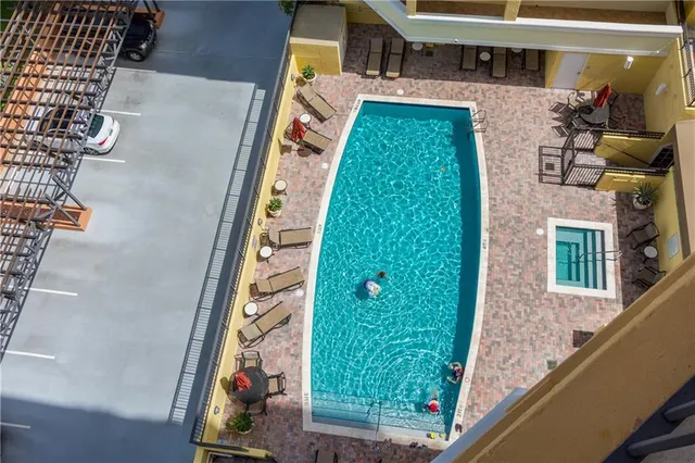a view of a balcony with wooden floor