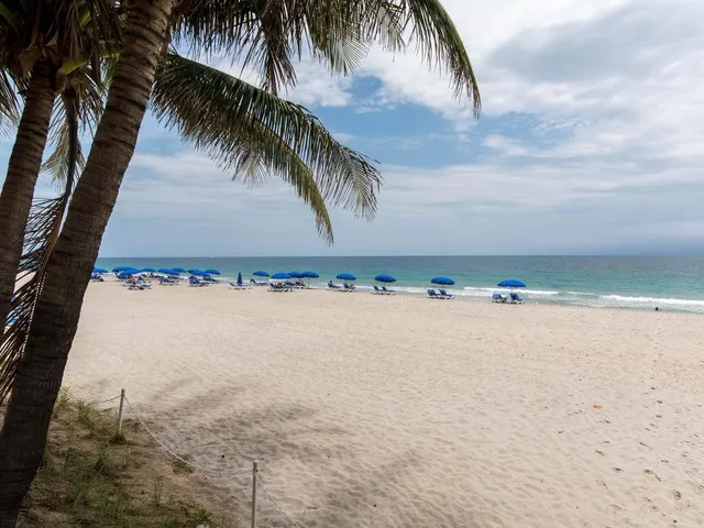 a view of a building with a street