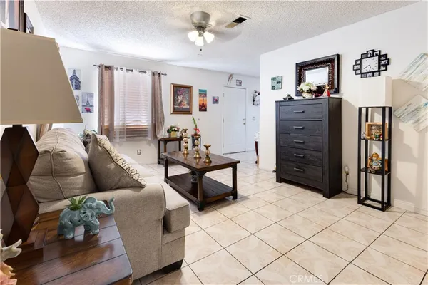a living room with furniture and window