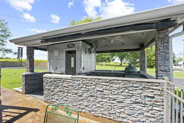 a view of a lake with a yard