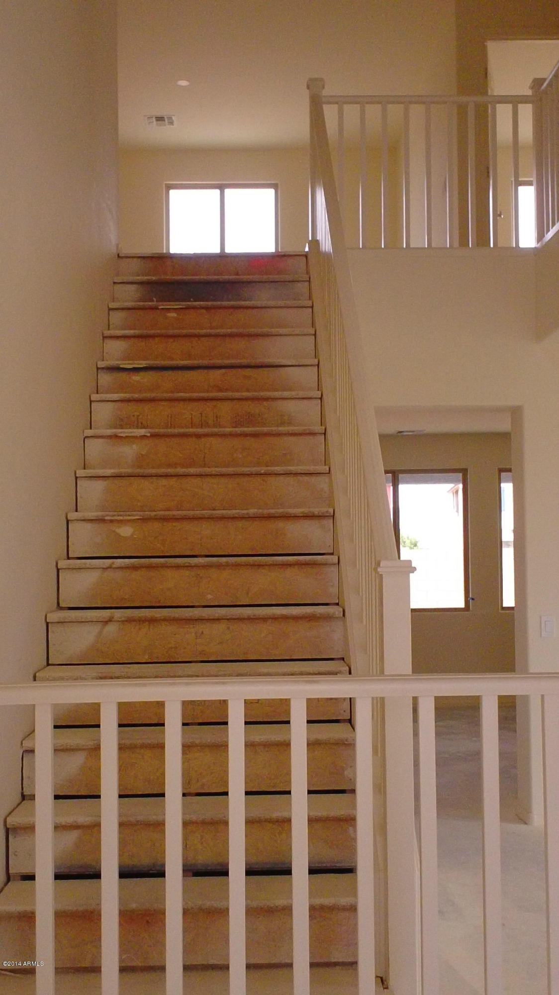 3038 East Roland Street Mesa, AZ 85213 - Photo 2 of 6 Painted Mission stair rail