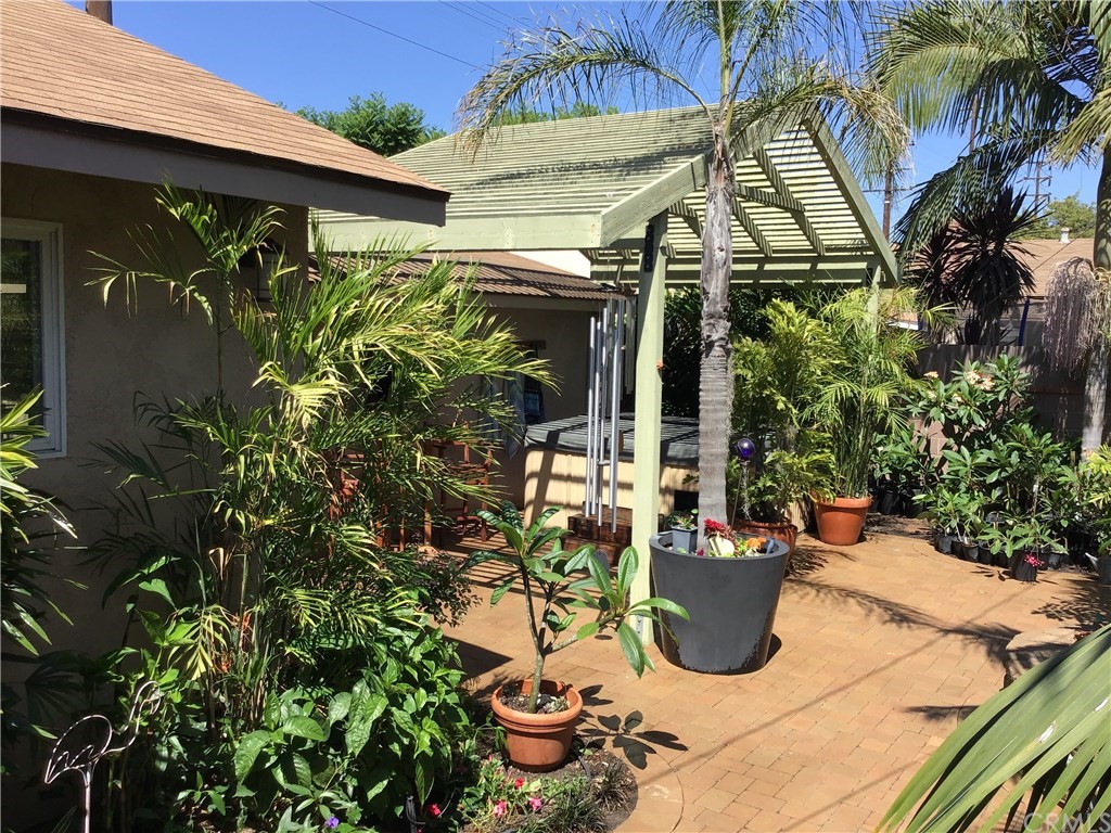 2154 Ostrom Avenue Long Beach, CA 90815 - Photo 28 of 29 a view of a porch with potted plants