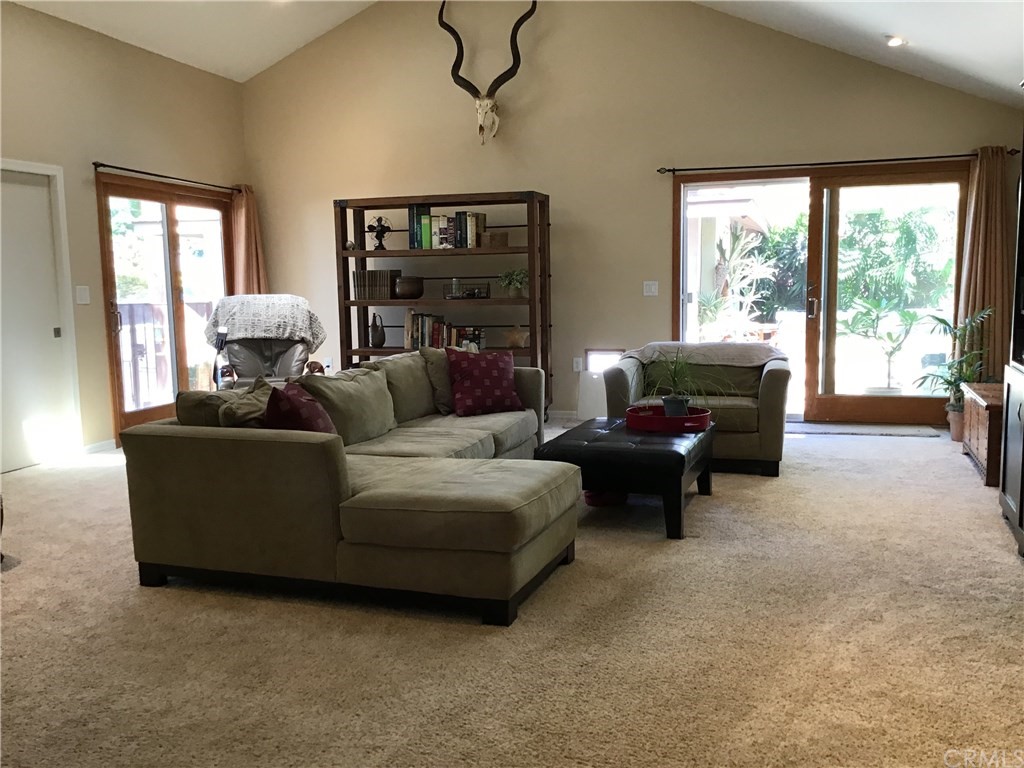 2154 Ostrom Avenue Long Beach, CA 90815 - Photo 9 of 29 a living room with furniture and a large window