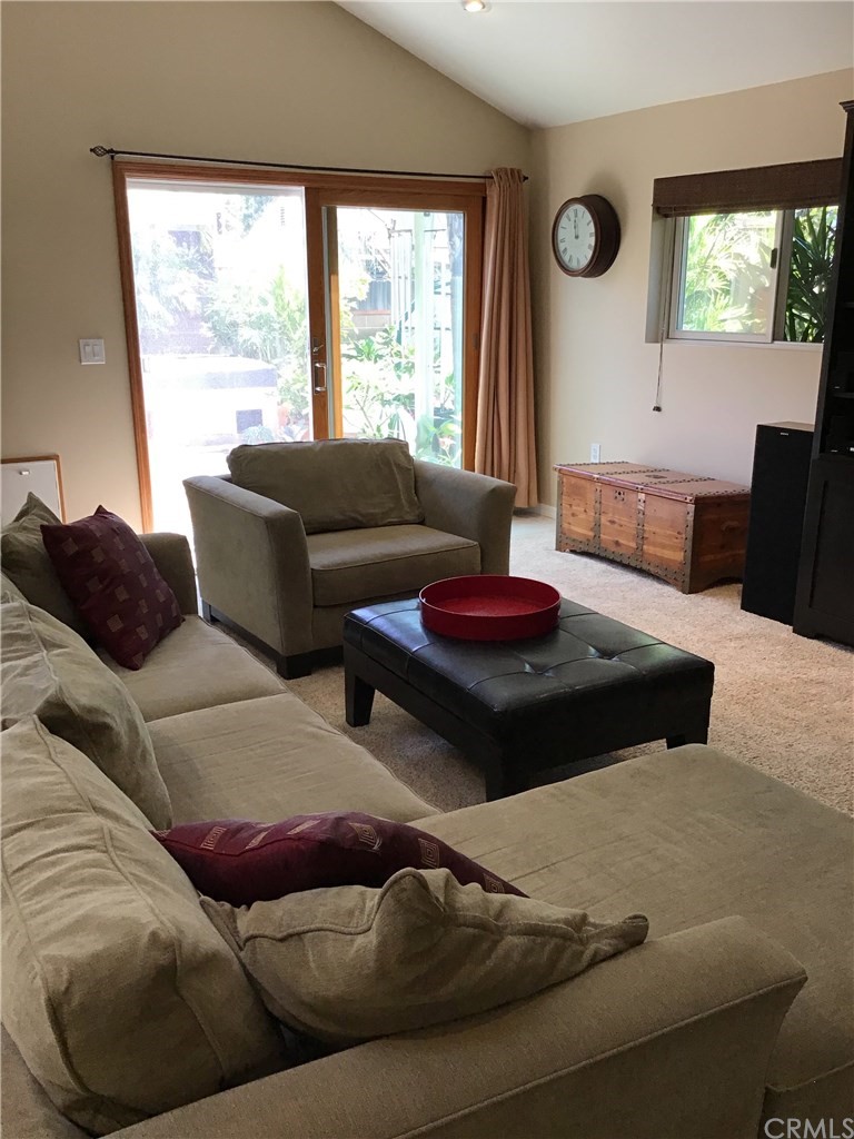2154 Ostrom Avenue Long Beach, CA 90815 - Photo 10 of 29 a living room with furniture and a large window