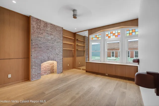 a room with furniture and a window