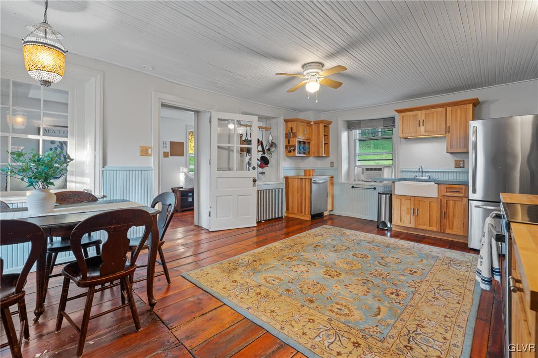 3225 Jordan Road Orefield, PA 18069 - Photo 16 of 50 a view of a dining room with furniture and a kitchen