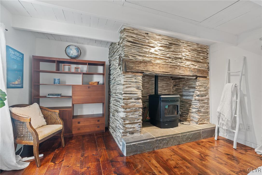 3225 Jordan Road Orefield, PA 18069 - Photo 24 of 50 a living room with furniture and a fireplace