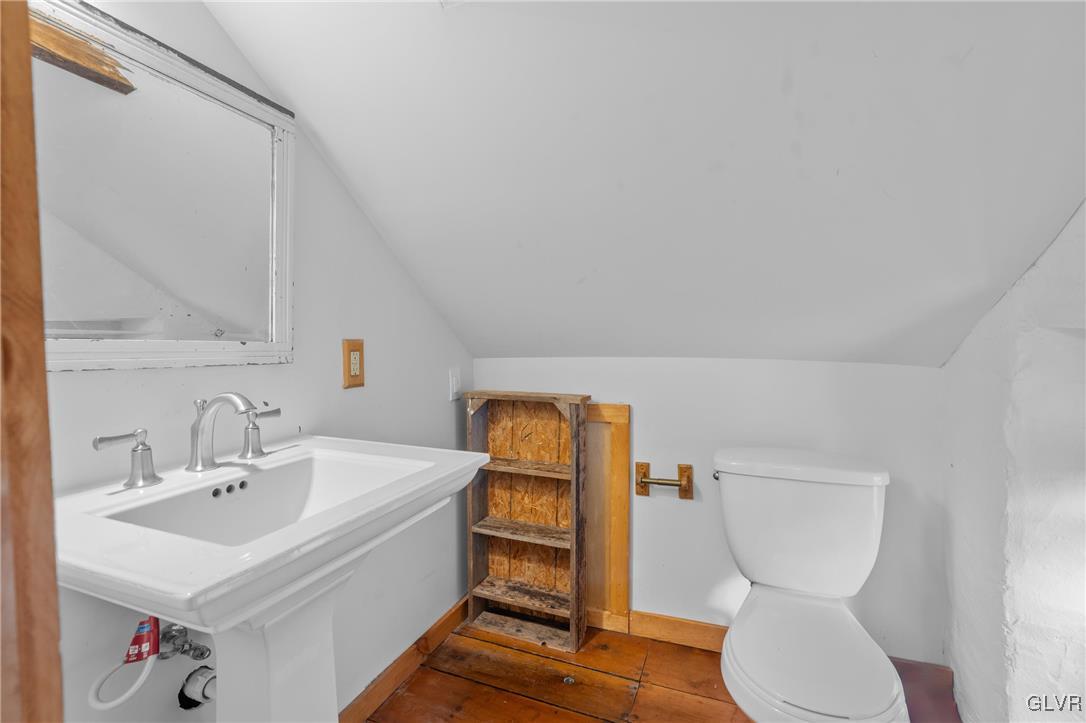 3225 Jordan Road Orefield, PA 18069 - Photo 36 of 50 a bathroom with a sink mirror and toilet