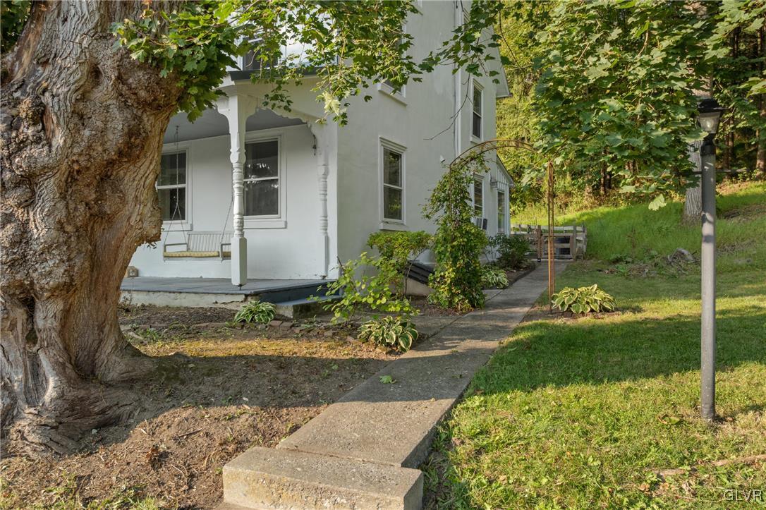 3225 Jordan Road Orefield, PA 18069 - Photo 4 of 50 a front view of a house with garden